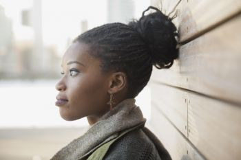 Side view of thoughtful woman outdoors